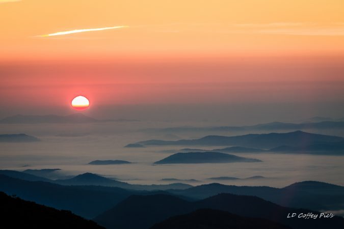 "Islands In The Clouds Near Milepost 420" by Larry Coffey