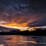 "Fiery Sunset over Frozen Lake" by Victor Ellison Fine Art Photography