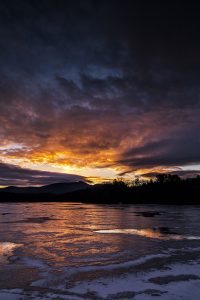 "Fiery Sunset over Frozen Lake" by Victor Ellison Fine Art Photography