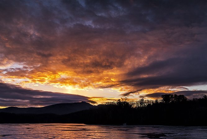 "Fiery Sunset over Frozen Lake" by Victor Ellison Fine Art Photography