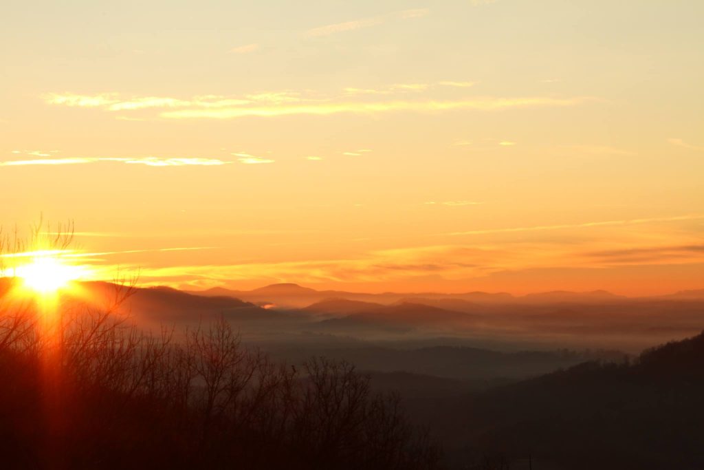 "Sunrise at Walnut Cove Overlook, Milepost 396.4" by Sheley Revis