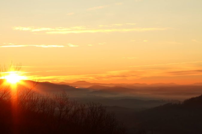 "Sunrise at Walnut Cove Overlook, Milepost 396.4" by Sheley Revis