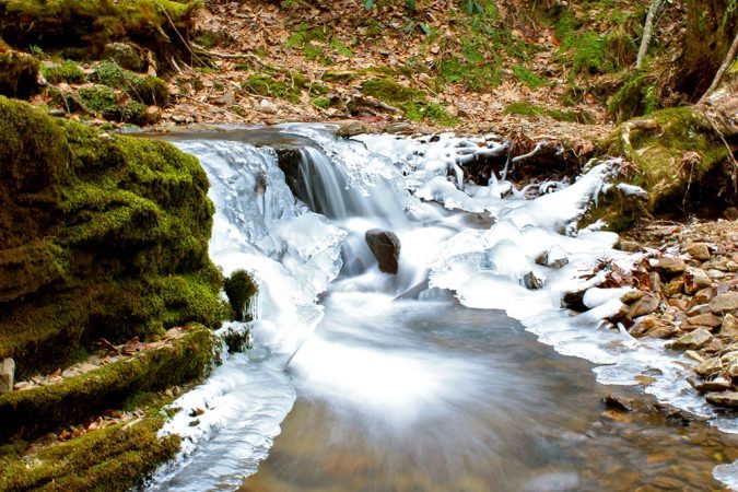 "Icy Cascades over Moss" by Picturesque Photography