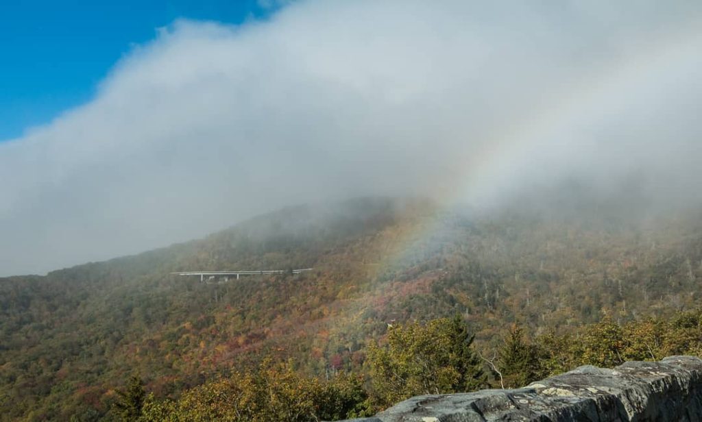 "Rainbow Over the Linn Cove Viaduct Mountainside" by Josh Lowe