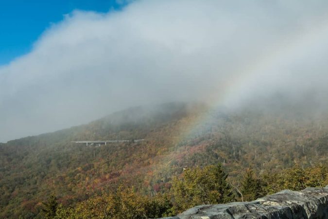 "Rainbow Over the Linn Cove Viaduct Mountainside" by Josh Lowe